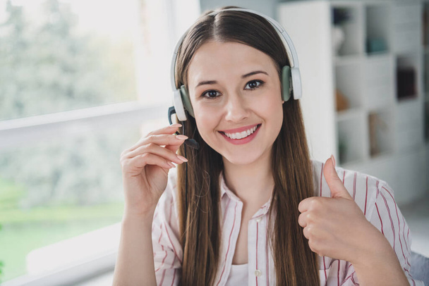 Photo portrait of attractive young woman working headset thumb up dressed stylish smart casual clothes interior cozy room home office. - Φωτογραφία, εικόνα