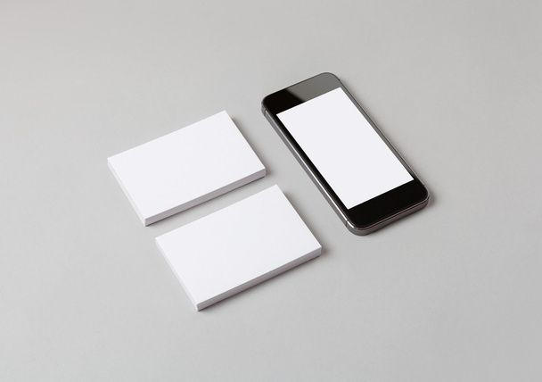 Business cards & smart phone - Foto, afbeelding