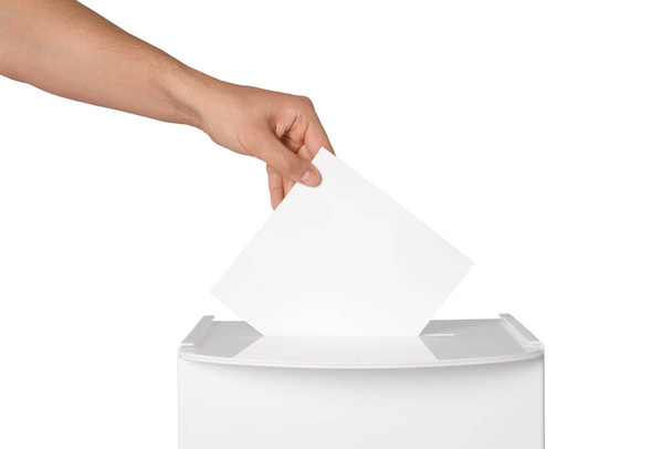 Man putting his vote into ballot box on white background, closeup - Fotoğraf, Görsel