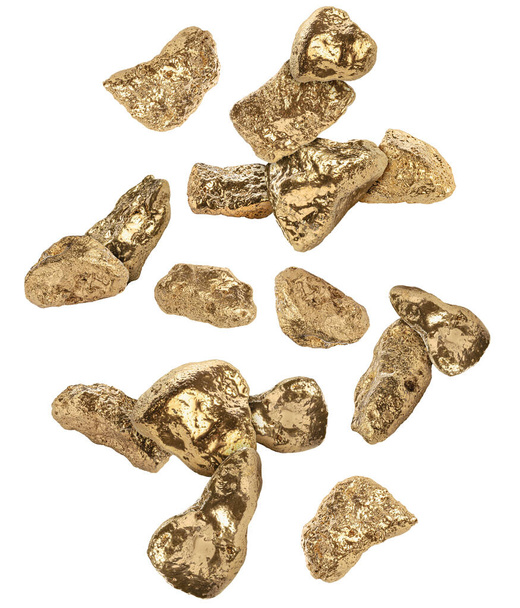 Many gold nuggets falling on white background - Foto, imagen