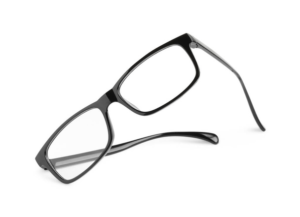 Stylish glasses with black frame isolated on white - Фото, зображення