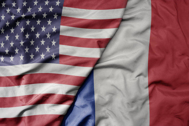 big waving colorful flag of united states of america and national flag of france . macro - Фото, зображення