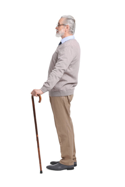 Senior man with walking cane on white background - Photo, image