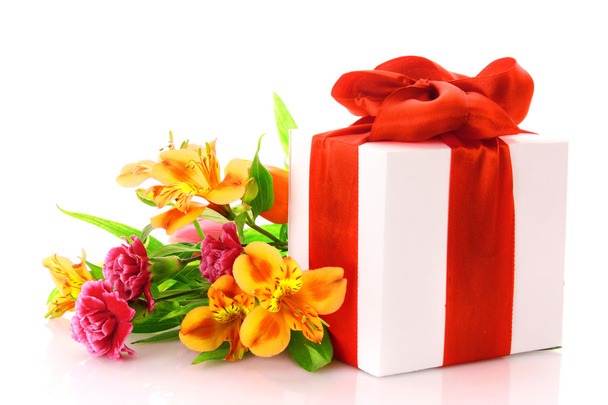 Orange lily and gift box on a white background - Foto, imagen