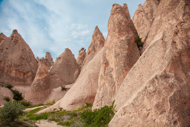 Cappadocia valley in the rocks against the background of the sky - Foto, immagini