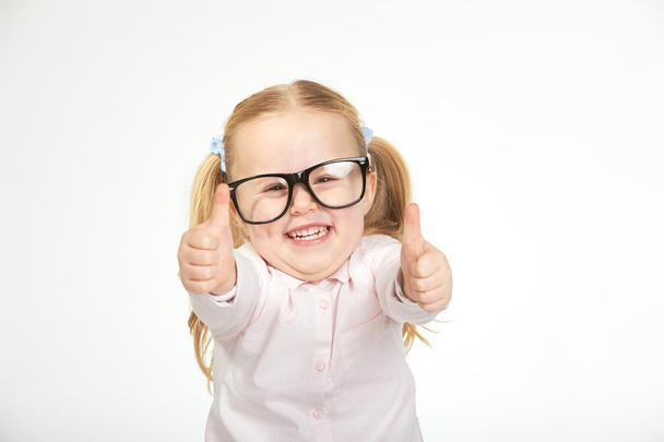 Cute little girl with glasses on a white background - Photo, Image