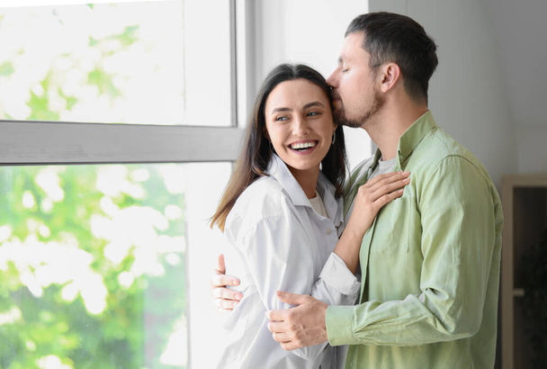Happy young couple at home - Photo, Image