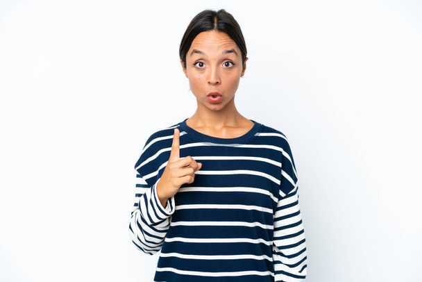 Young hispanic woman isolated on white background intending to realizes the solution while lifting a finger up - Φωτογραφία, εικόνα