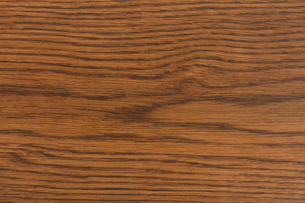 Fondo de madera granulada envejecida marrón con textura de grano con espacio de copia para su mensaje o uso como textura - Foto, Imagen