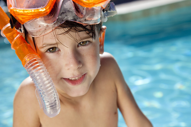 Happy Boy In A Swimming Pool with Goggles and Snorkel - Valokuva, kuva