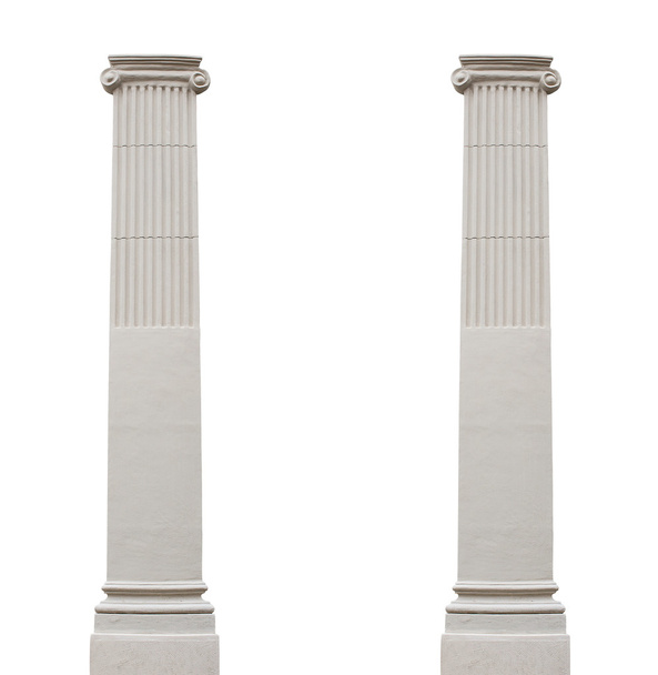 Két elszigetelt építészeti oszlop, fehér alapon - Fotó, kép