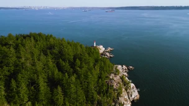 Aerial view of historical landmark Point Atkinson Lighthouse and coastal line, West Vancouver, British Columbia, Canada. - Footage, Video