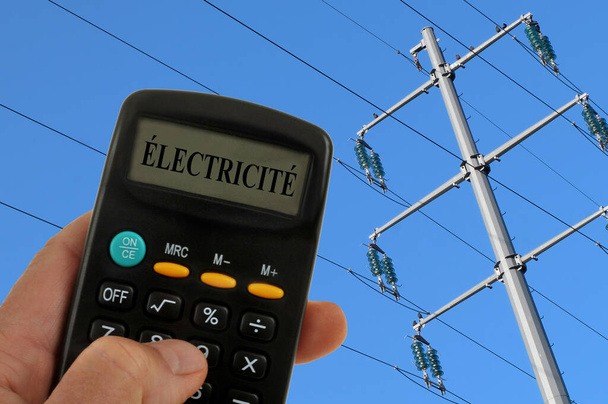 Koncepcja francuskich wydatków energetycznych z kalkulatorem i biegunem elektrycznym  - Zdjęcie, obraz