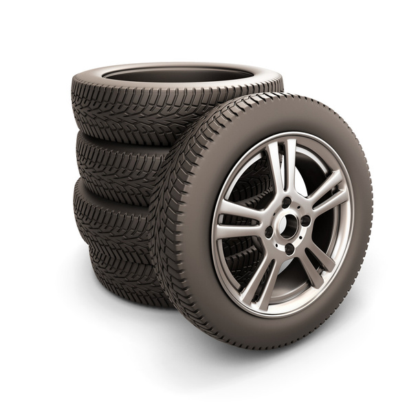 Stack of car tires and car wheel - Photo, Image