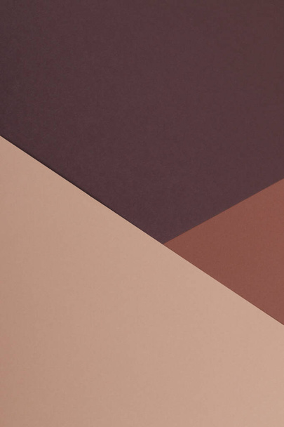 Mehrfarbiger Hintergrund aus Papier in verschiedenen Brauntönen. Geometrischer Hintergrund. - Foto, Bild