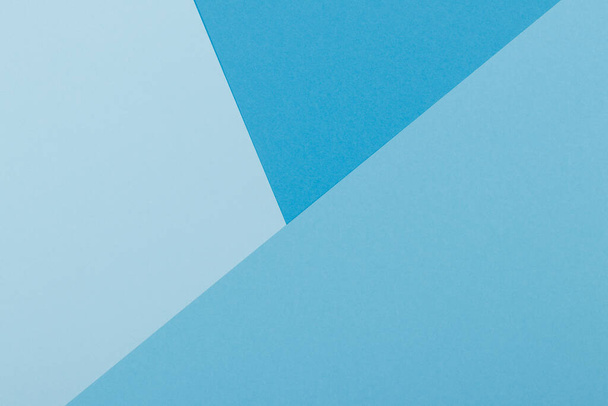 Multicolor háttér egy papír különböző árnyalatú kék. Geometriai háttér. - Fotó, kép