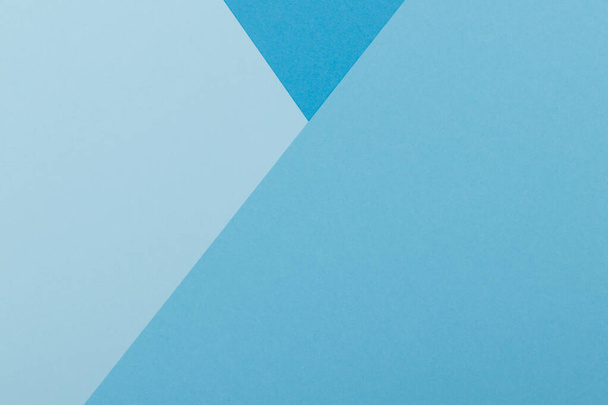 Multicolor háttér egy papír különböző árnyalatú kék. Geometriai háttér. - Fotó, kép