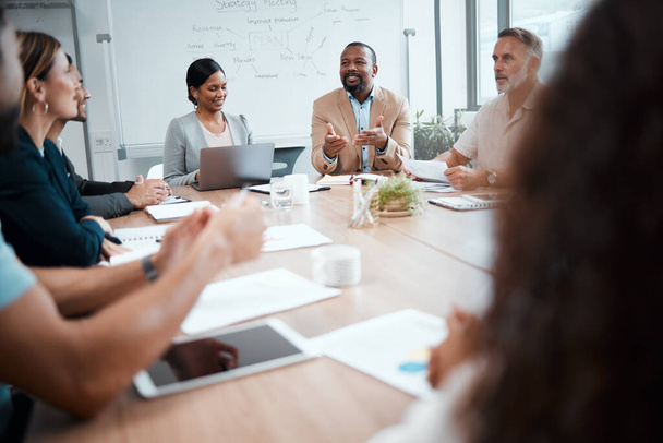 Business people, diversity and meeting for idea in strategy, planning or brainstorming at office. Group of employees in team discussion, collaboration or project management in conference at workplace. - Photo, Image