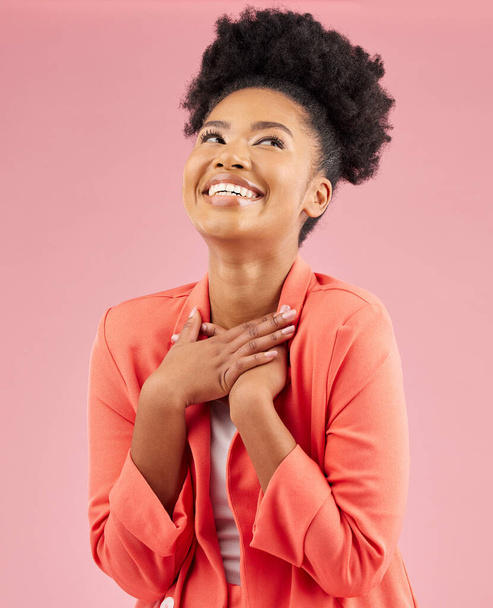 Business woman, proud and studio with a smile feeling excited and happy from advertising job. African female person, worker and pink background with creative employee with confidence of professional. - Foto, imagen