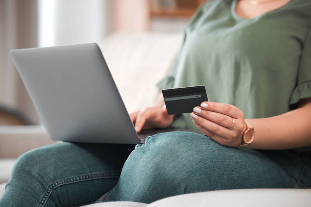Hand, laptop and credit card for ecommerce with a customer on the internet from home. Computer, online shopping and payment with a person using a bank app for finance, accounting or budget planning. - Photo, Image