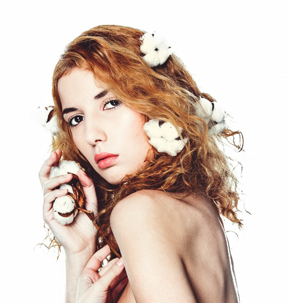 Beautiful girl with cotton plant - Foto, afbeelding