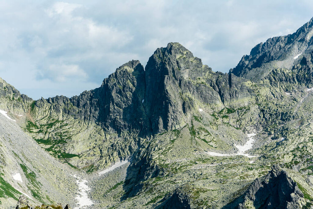 A great peak Ostry Szczyt (Ostry stit) climbed by mountaineers on difficult climbing routes. Tatra Mountains. - Foto, immagini