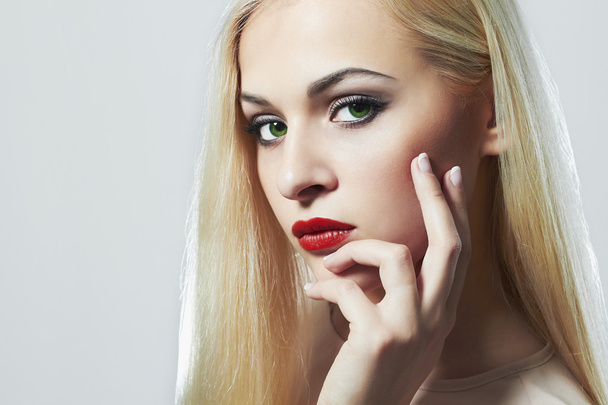 Blond woman with manicure.Beautiful girl with evening make-up - Zdjęcie, obraz