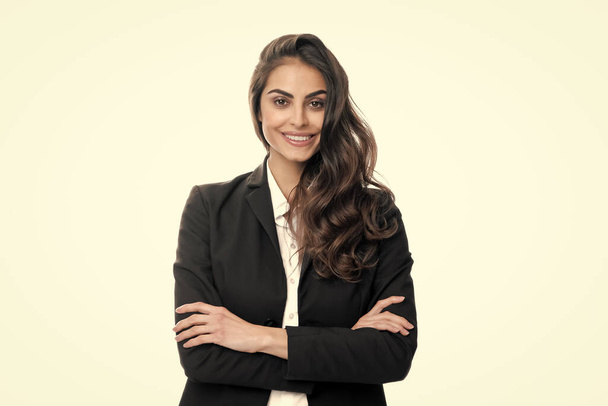 Portrait of business woman in suit crossed arms. Confidence businesswoman against grey background with copy space. Female employee young secretary - Фото, изображение