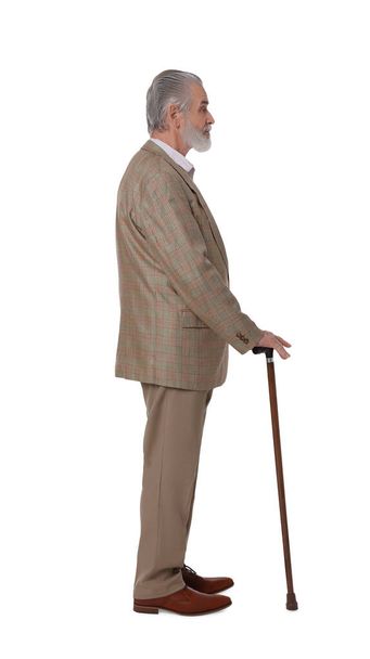Senior man with walking cane on white background - Fotografie, Obrázek