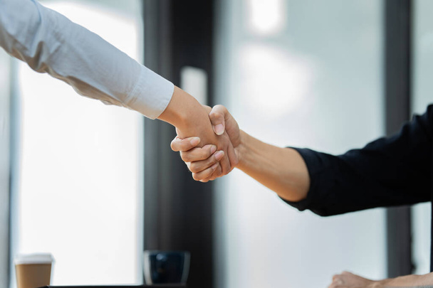 Business man and woman handshaking partner business handshake agreement cooperation. - Φωτογραφία, εικόνα