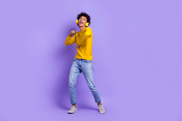 Full body photo of young guy dancing boogie woogie carefree chill party rest relax discotheque meloman isolated on violet color background. - Photo, Image