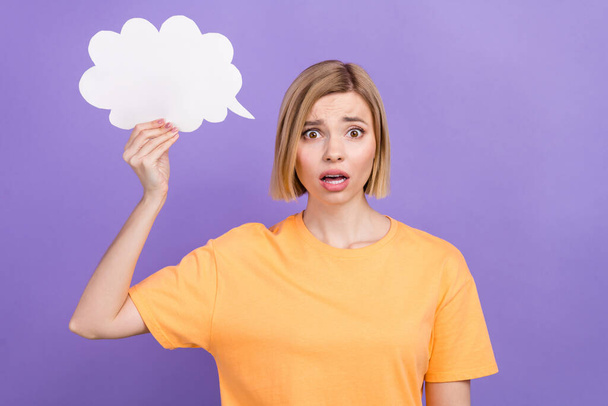 Photo of attractive funny staring girl confused hold bubble paper cloud oops wtf comics style picture isolated over violet color background. - Foto, Bild