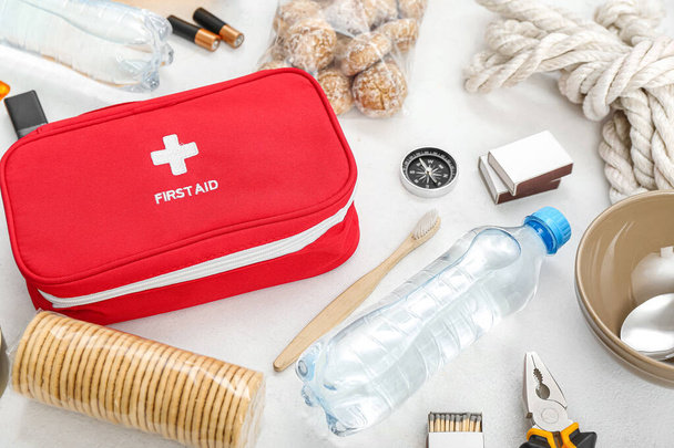 Necessities for emergency bag on white background, closeup - Photo, Image