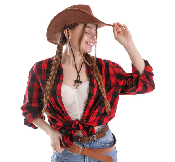 Young cowgirl on white background - Fotoğraf, Görsel