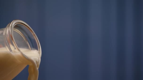 The text describes images of beer, liquid, and coffee glasses with blue backgrounds and foam - Footage, Video