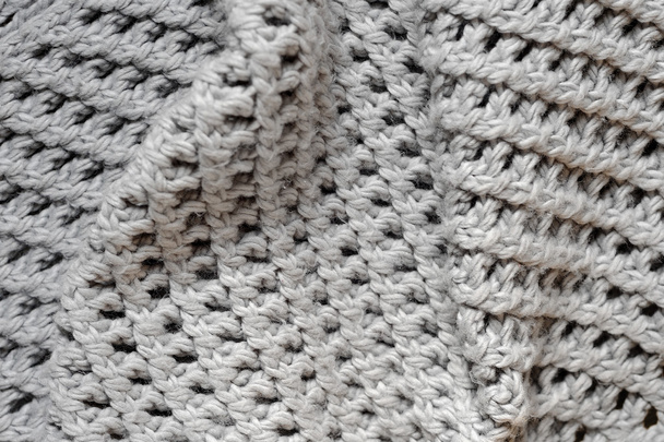 handgemaakte grijs breien wol textuur achtergrond - Foto, afbeelding