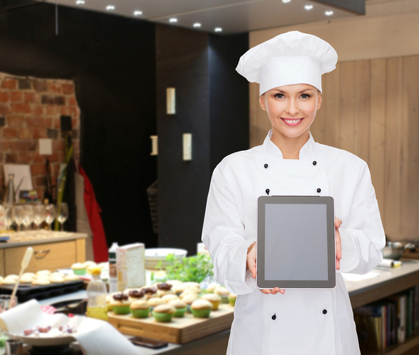 female chef with tablet pc - Фото, изображение