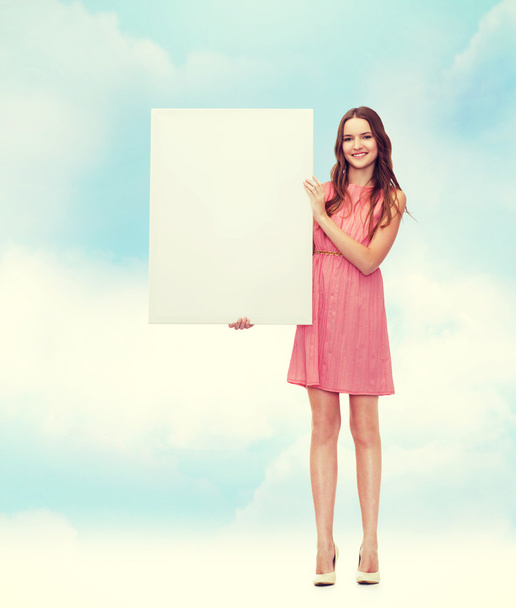 Young woman with   blank board - Foto, Bild