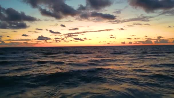 Sea scenery. Drone view. Sunset horizon. Nature beauty. Water landscape. Blue ocean waves relaxing motion on red orange sun light skyline background aerial shot. - Metraje, vídeo