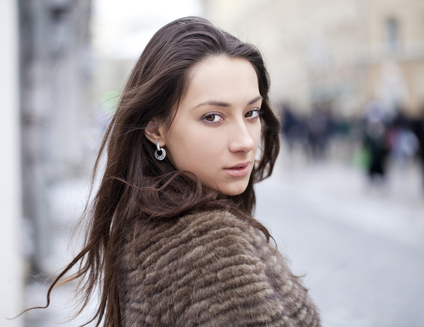 Young beautiful woman in stylish mink coat  - Foto, afbeelding