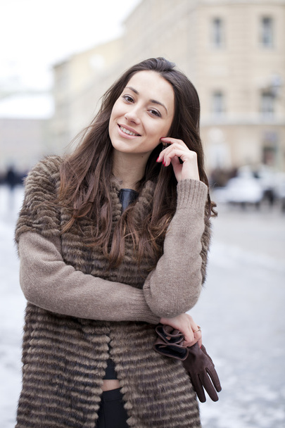 Young beautiful woman in stylish mink coat  - Valokuva, kuva