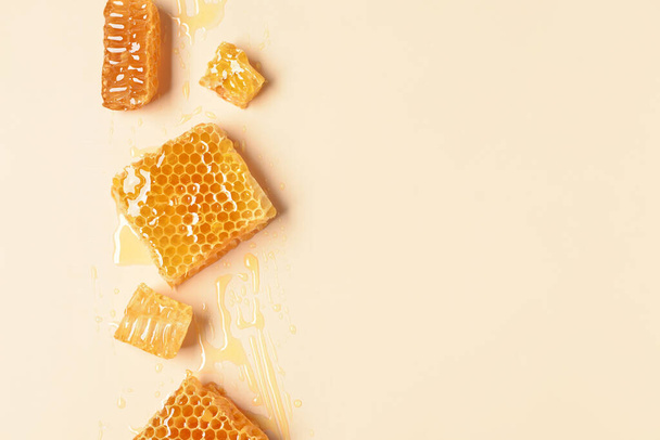 Sweet honeycombs on yellow background - Photo, Image