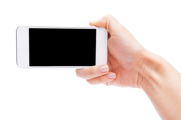 Boş ekranda beyaz backgro ile beyaz Smartphone tutan el - Fotoğraf, Görsel