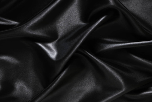 Silk fabric, abstract wavy black satin fabric background - Foto, Imagem