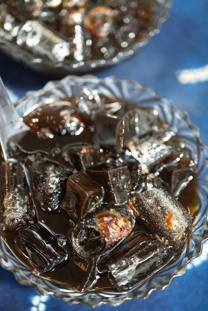 Grass jelly or herb jelly, Dessert in Southeast Asia made from plant eating with syrup and ice - Fotó, kép