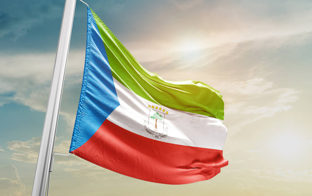 Equatorial Guinea waving flag against sky - Фото, изображение