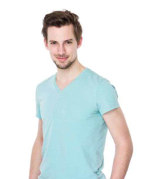 Handsome man in green t shirt - Фото, изображение