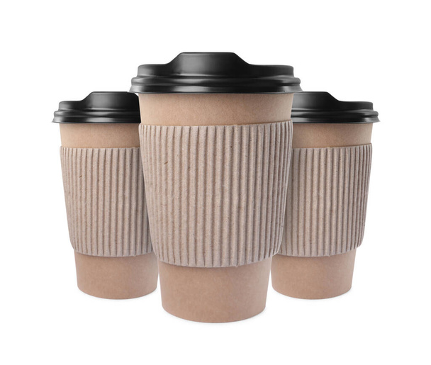 To-go drink. Set with three paper coffee cups isolated on white - Foto, immagini