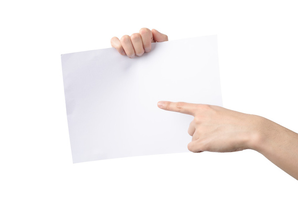 hands holding and pointing A4 paper, isolated on white - Photo, Image