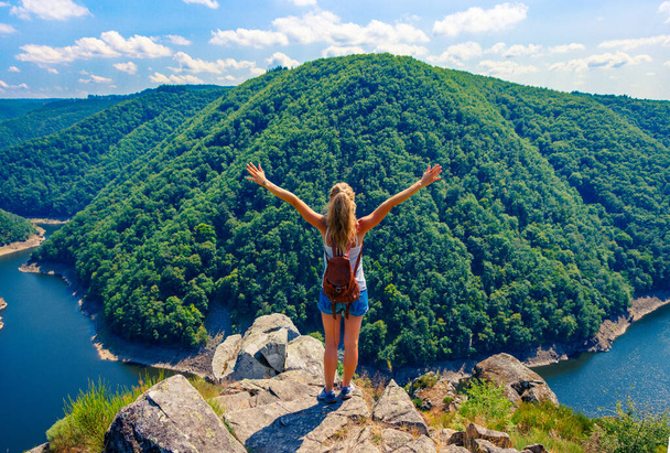 Happy Hiker woman on the top enjoying view of river and mountain- travel, wanderlust,adventure,achievement concept ( dordogne in France) - Fotografie, Obrázek